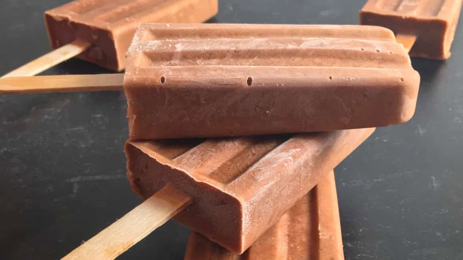 Chocolate smoothie pops made with peanut butter and bananas.