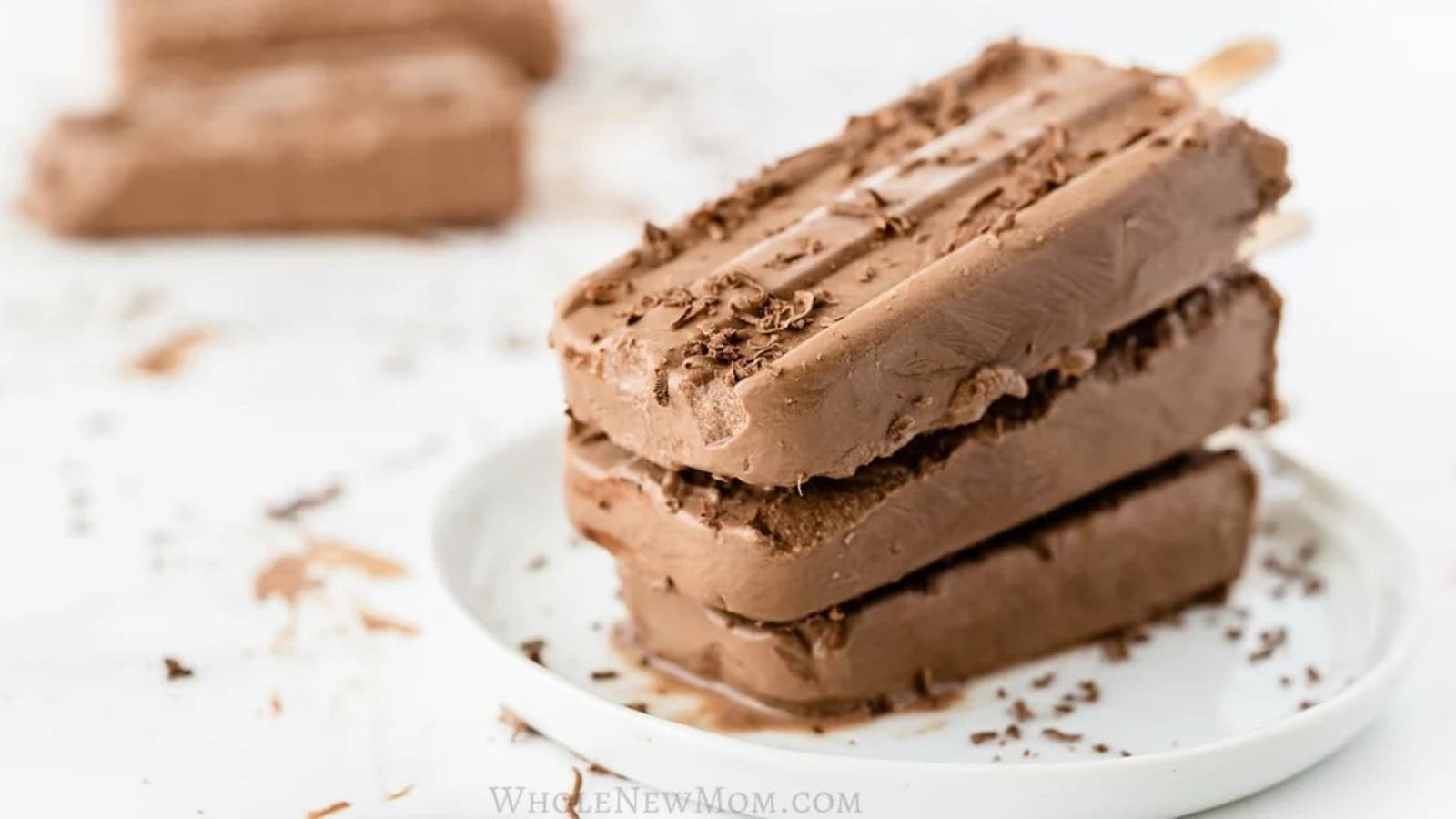 Creamy sugar-free chocolate fudgesicles frozen into a refreshing treat.