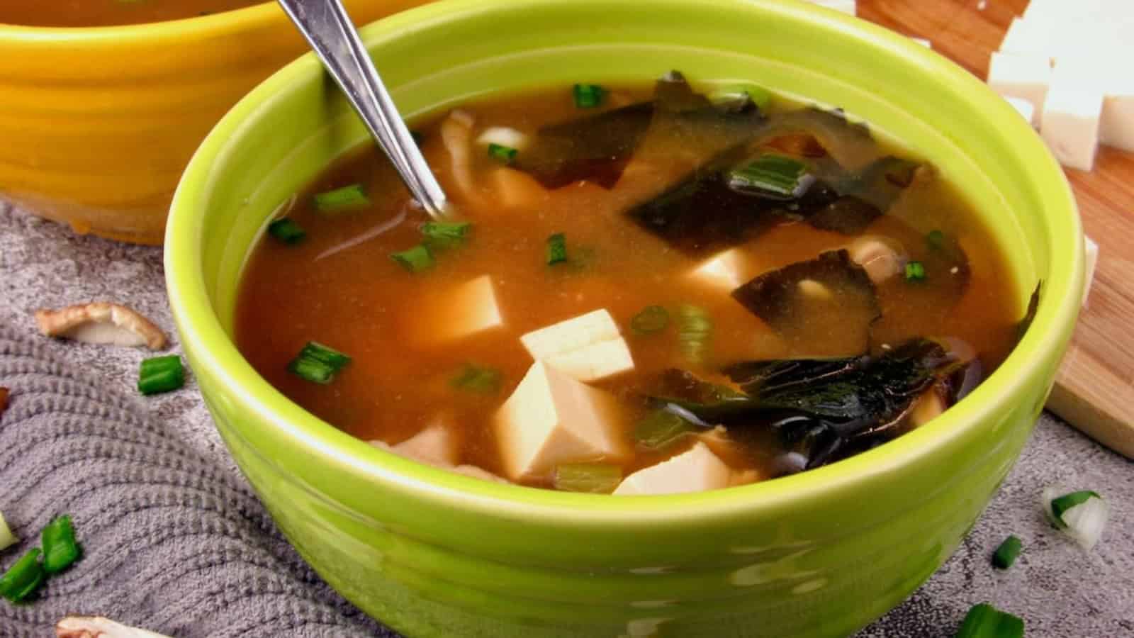 Light vegan miso soup with tofu, seaweed, and green onions.
