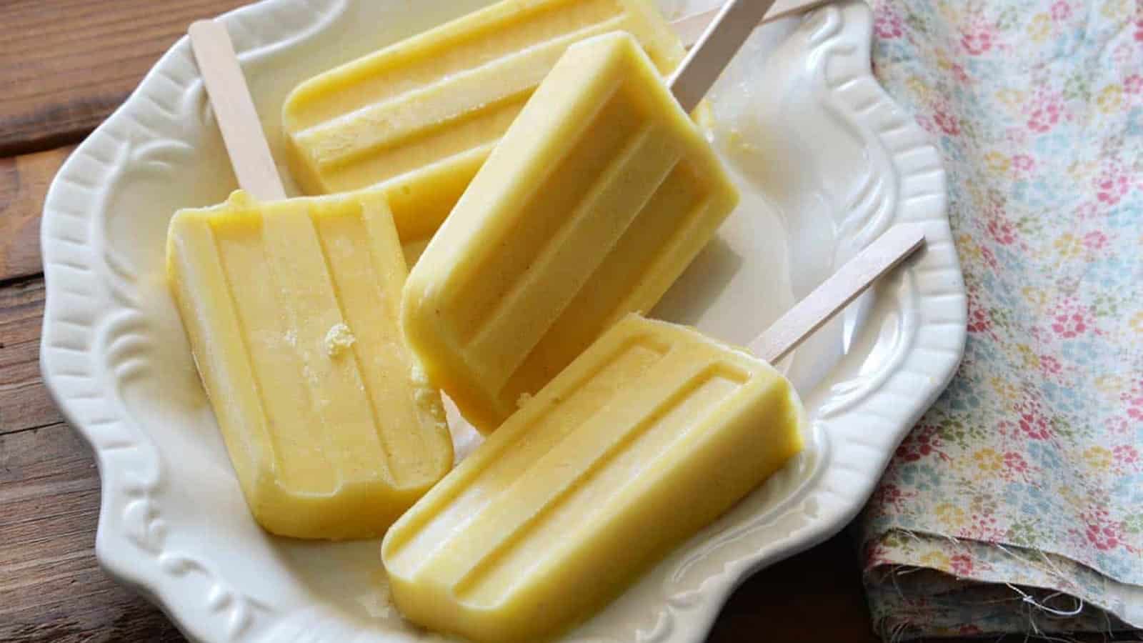 Creamy vanilla pineapple popsicles with a tropical twist.