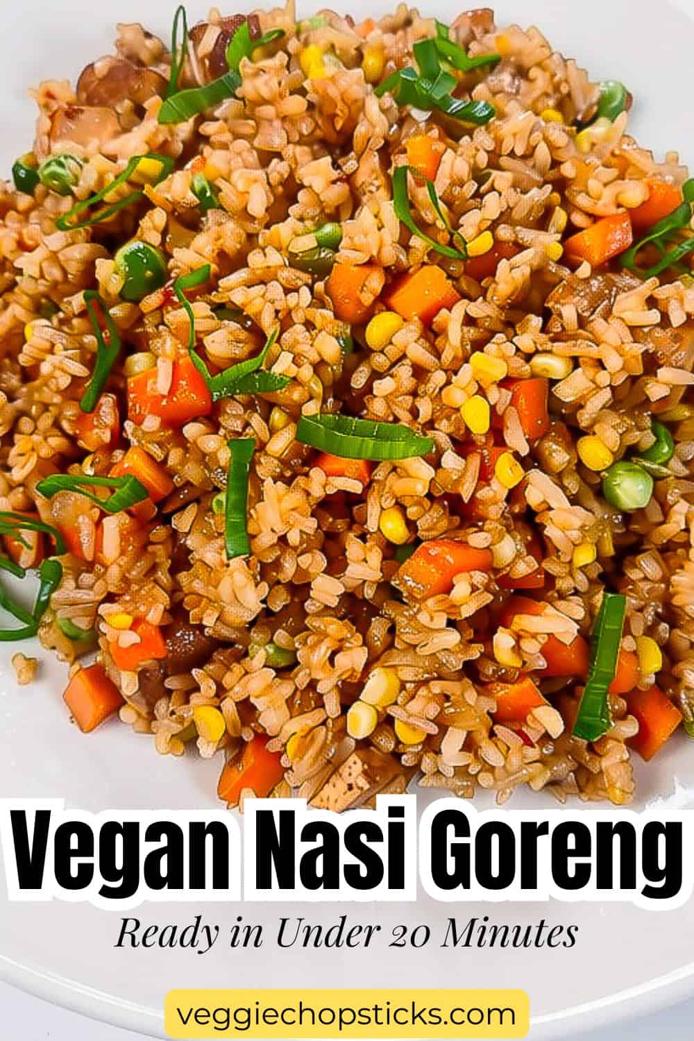 Vegan nasi goreng with vegetables and tofu served in a white bowl, featured in a Pinterest pin graphic.