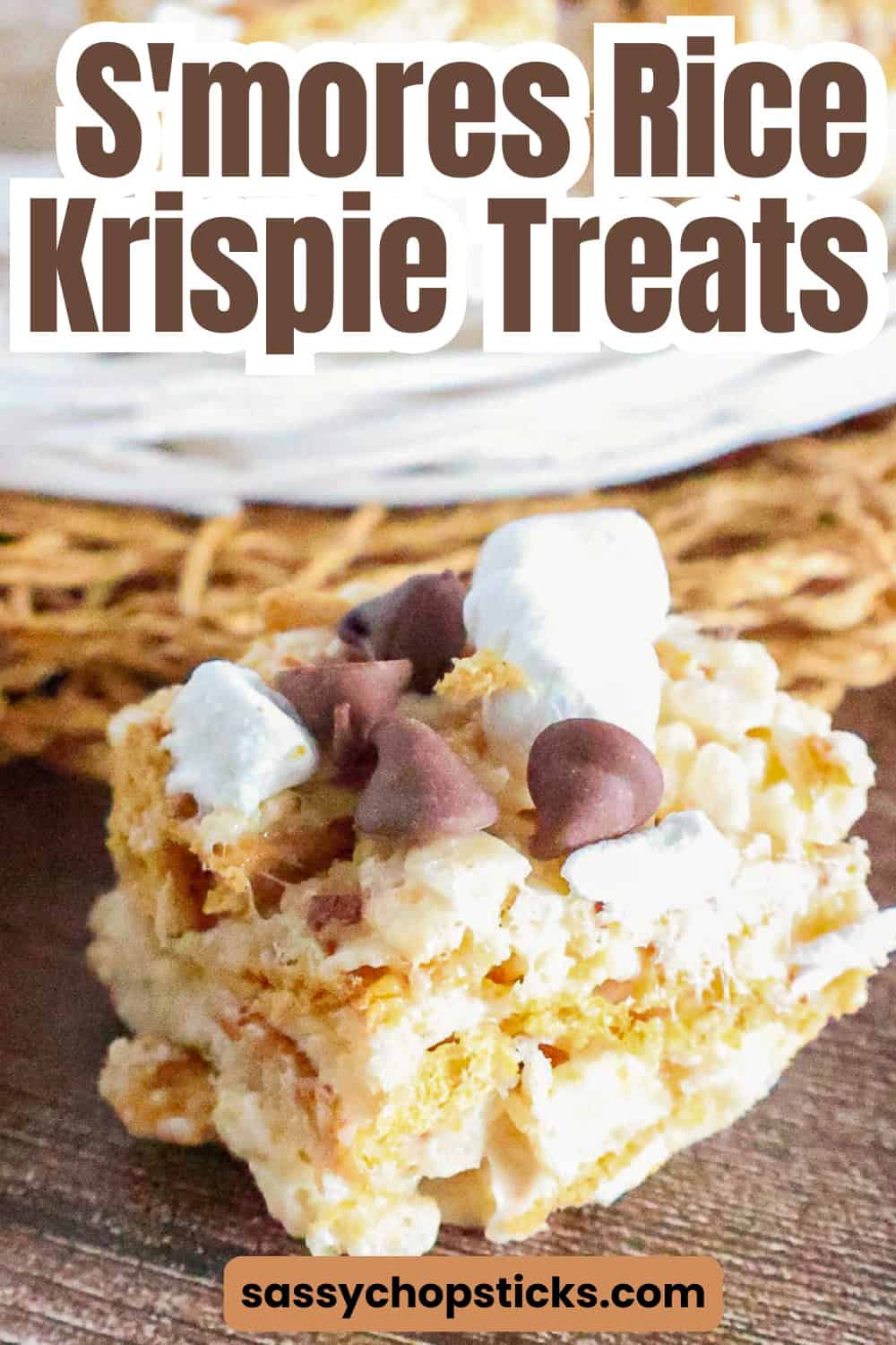 Pinterest graphic for easy S'mores Rice Krispie treats recipe with chocolate chips and mini marshmallows.