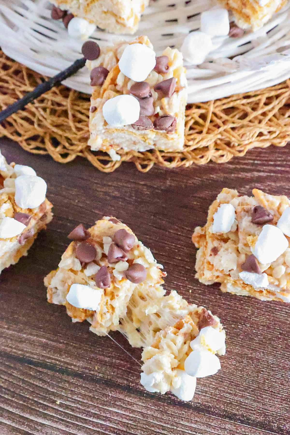 Pull-apart S'mores Rice Krispie treats showing stretchy melted marshmallows.