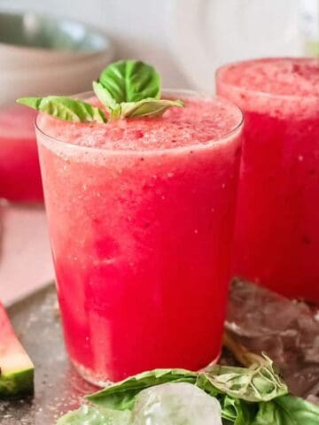 Frozen watermelon wine slushie in a glass.