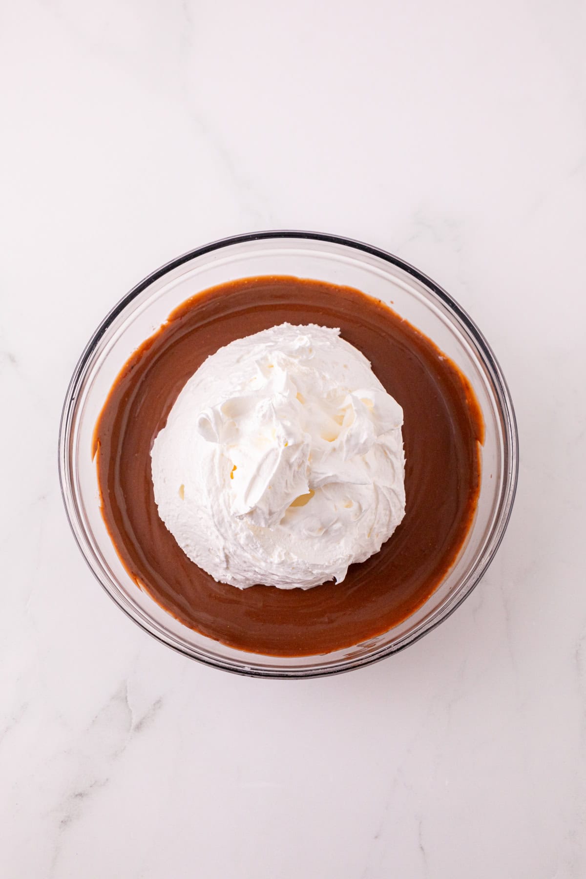 Cool Whip added to the chocolate pudding and Nutella mixture.